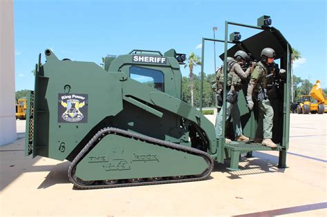 precision armor skid steer|armored swat vehicle.